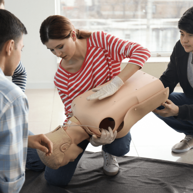 Participants practicing CPR during the HLTAID011 Provide First Aid course in Parramatta