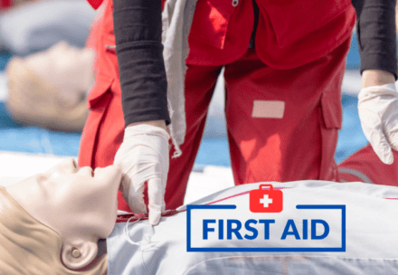 Trainer demonstrating CPR techniques during a first aid course in Parramatta, NSW